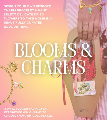 Advertisement for 'Blooms & Charms' product featuring a hand holding a bouquet and jewelry.