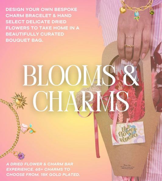 Advertisement for 'Blooms & Charms' product featuring a hand holding a bouquet and jewelry.